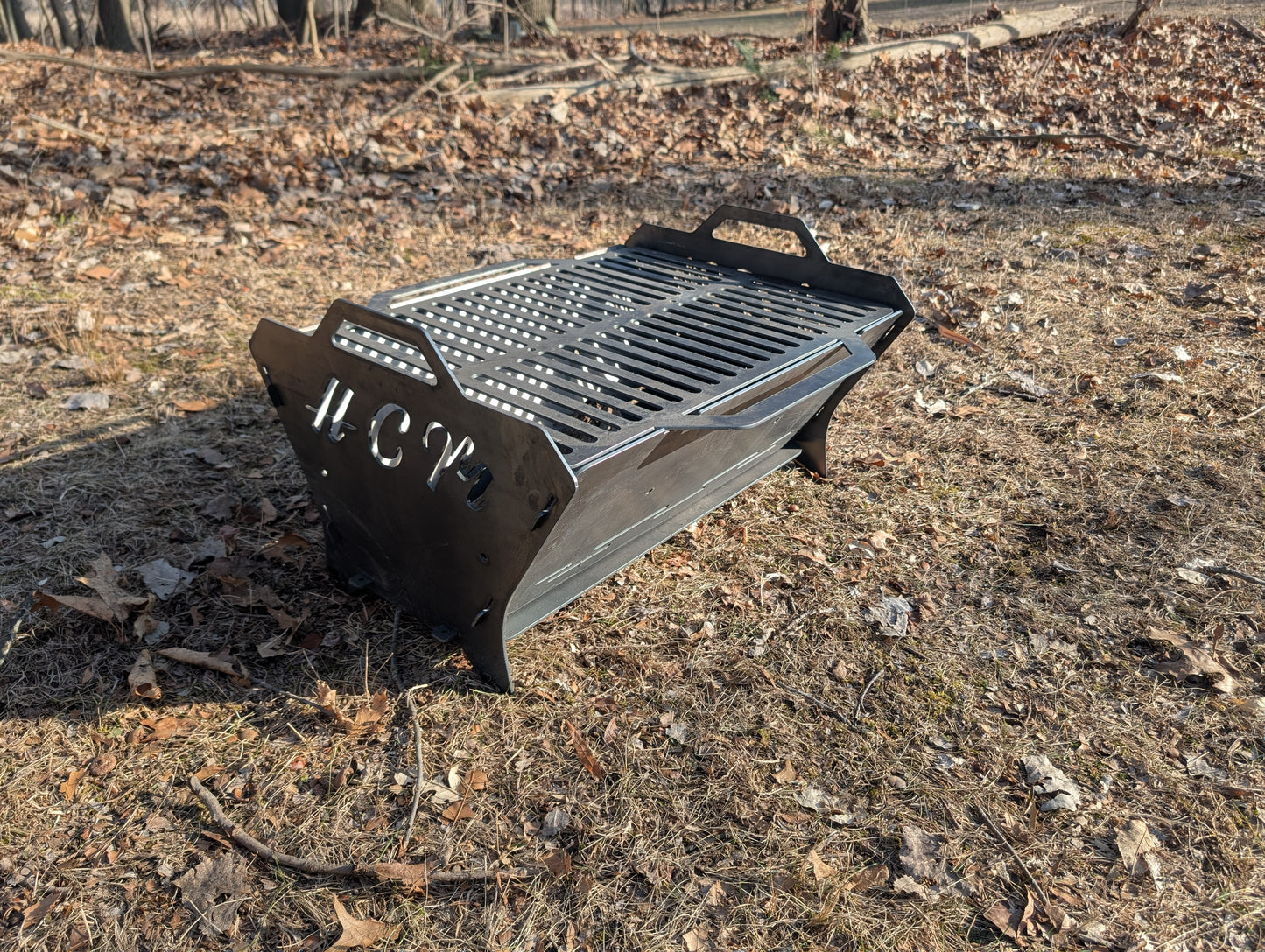 The Travel Collapsible Firepit & Grill